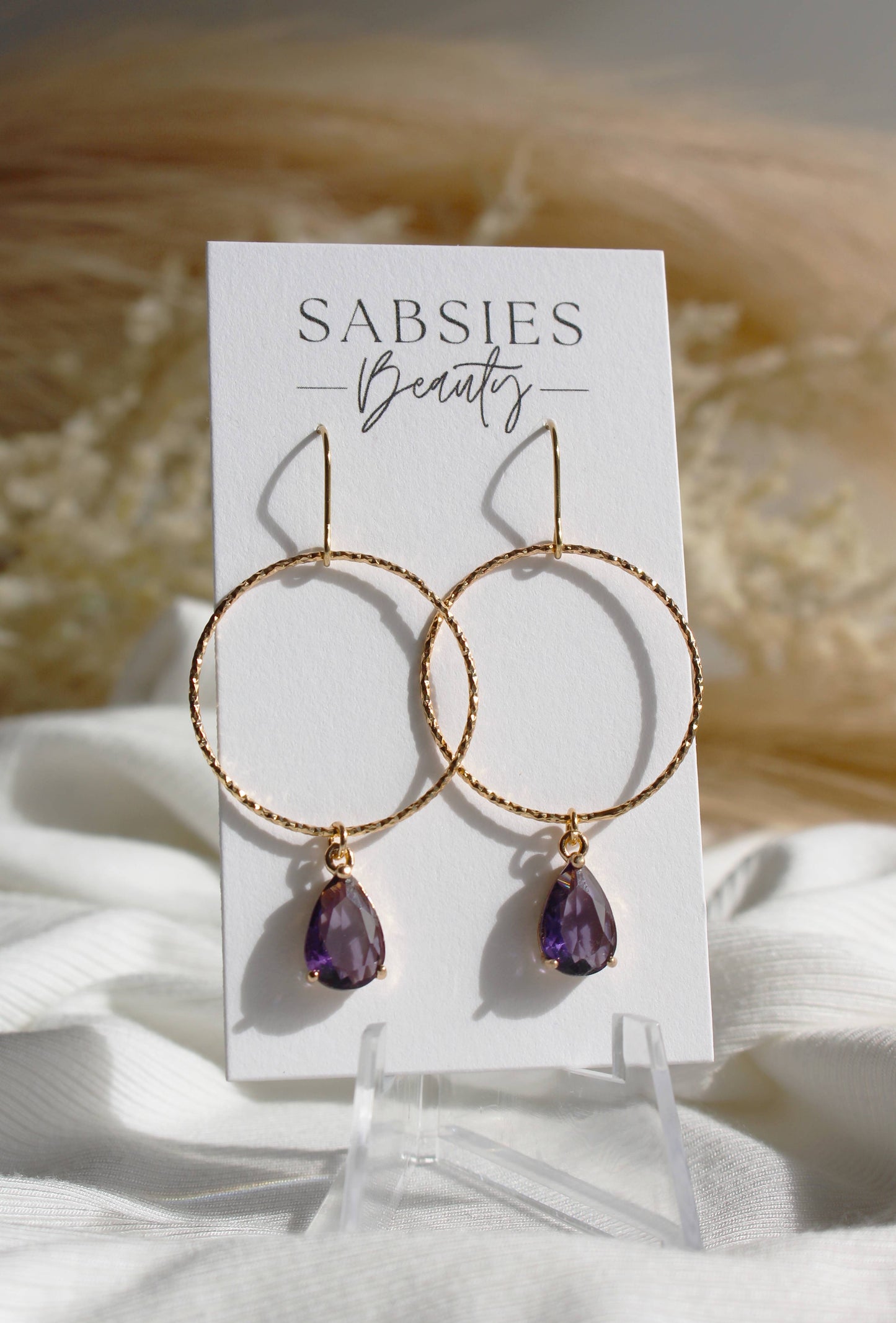 Shiny Gold Hoop with Purple Gem