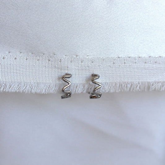 Wavy Huggie Rhodium Plated